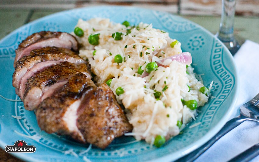 duck and risotto on a plate 